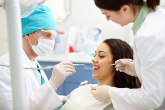 dentist examining a patient's teeth