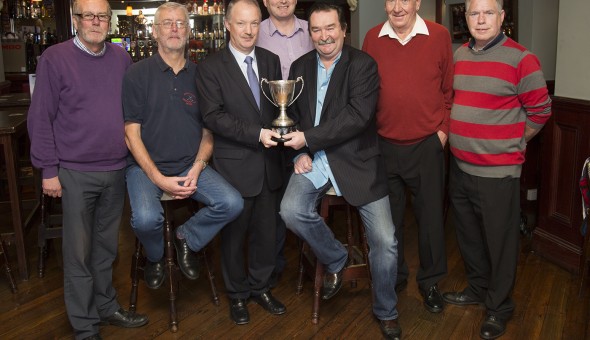 Presenting the Captain's Day Cup to Gerry Grassick in the Roundabout Pub, Artane with the pub proprietor, Kevin Connellan
