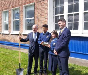 Burying a time capsule in Joeys Fairview, 2023